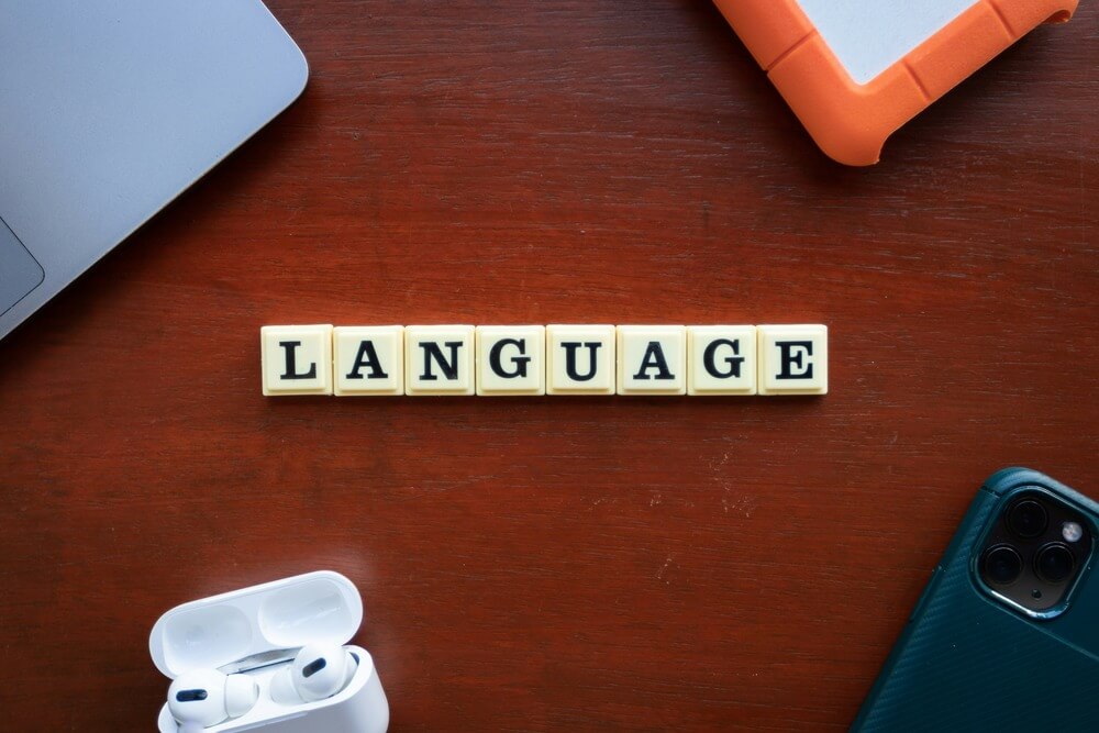 Letter tiles spelling out the word language