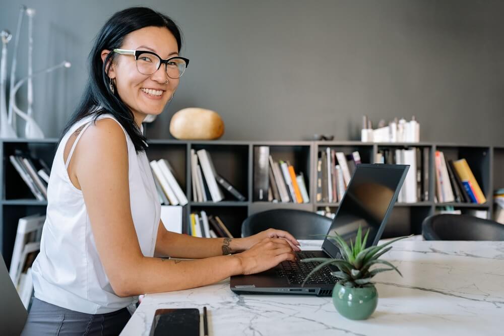 A woman using a laptop