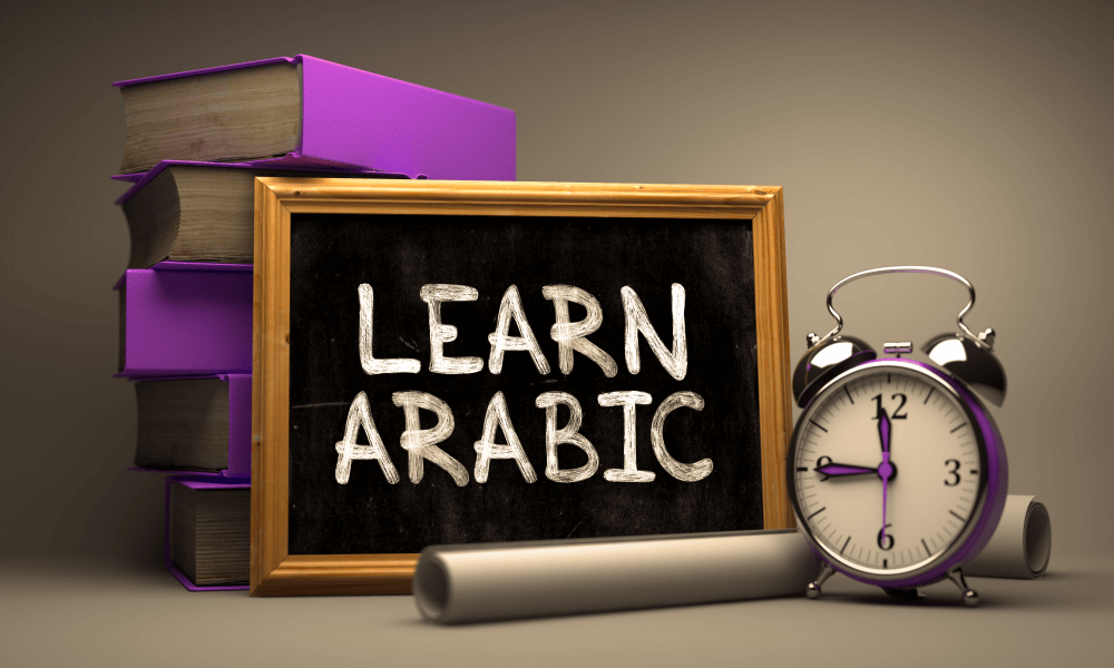 The words Learn Arabic written on a chalkboard